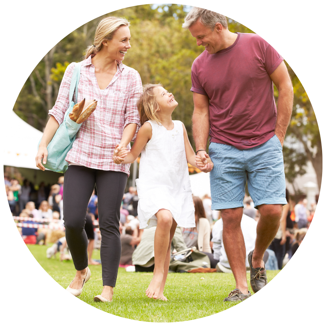 Family relaxing at outdoor summer event
